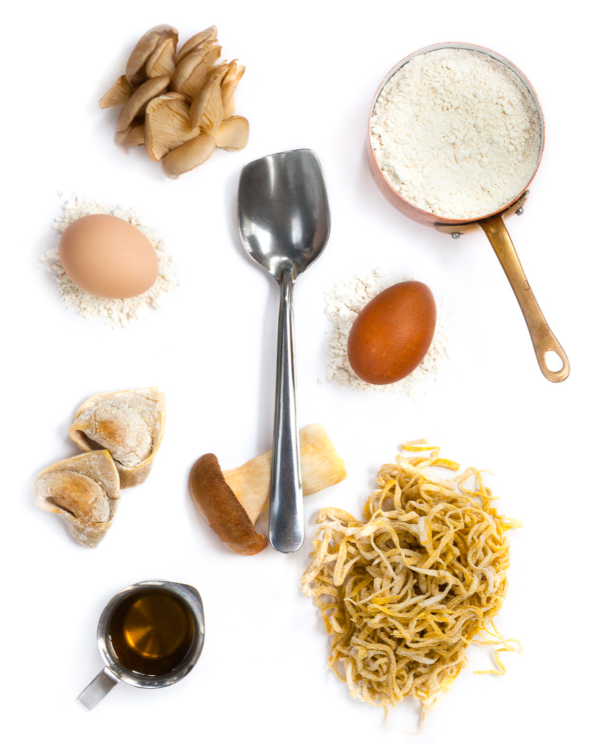 Spoonfuls of Inspiration: Chris Hall - Pasta Lover Spoonful portrait of Chef Chris Hall titled Pasta Lover, featuring flour, eggs, and handmade tortelloni with a shovel-shaped transformer spoon.