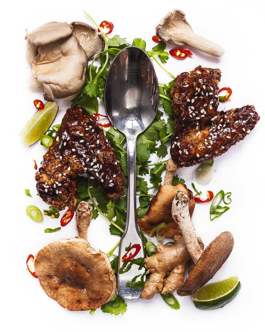 Spoonfuls of Inspiration: Ryan Hidinger - Taking Stock in Memories Spoonful portrait of Chef Ryan Hidinger titled Taking Stock in Memories, featuring chicken wings, shiitake and chanterelle mushrooms, and lime.