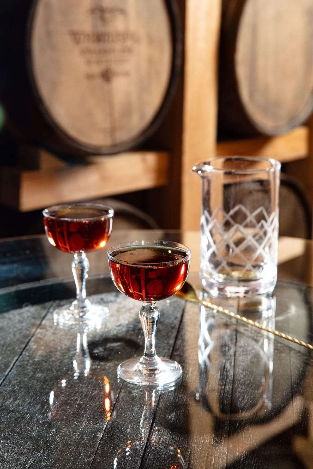 WhistlePig Rye Whiskey cocktail in an etched glass with orange peel garnish