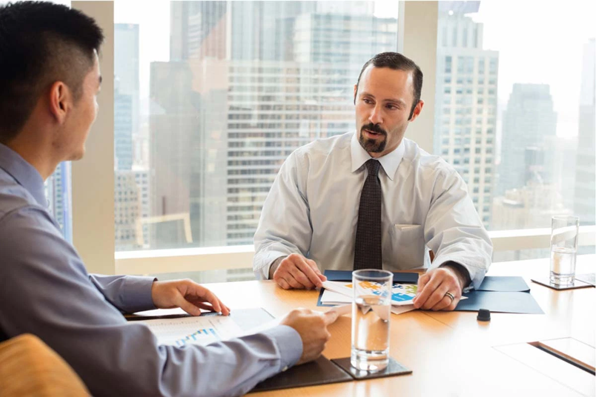 Barclays corporate marketing photography showing collaborative team meeting